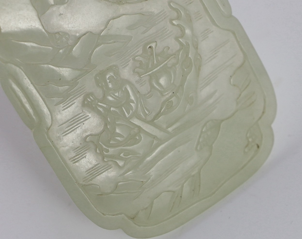 A Chinese white jade ‘He Xiangu’ shaped rectangular plaque, 18th/19th century